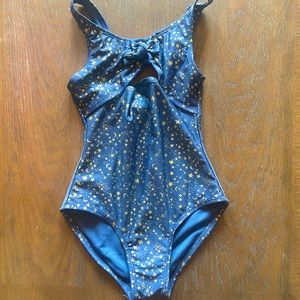 2/$10, 3/$12 Like new girls 1-piece swimsuit, blue with gold stars, cutout sides
